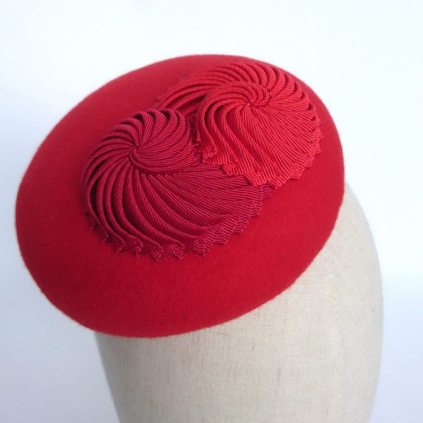 Red hat with pleated ribbon nautilus shells by Imogen's Imagination