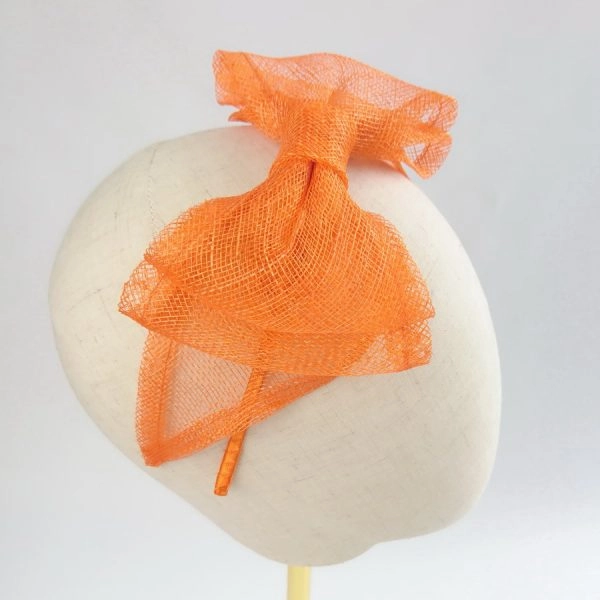 Orange Womens Hair Accessories - side view of large orange sinamay bow