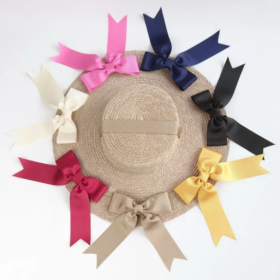 Oyster Straw Hat Surrounded by Bows in Black, Pink, Ivory, Navy, Red, Gold and Yellow