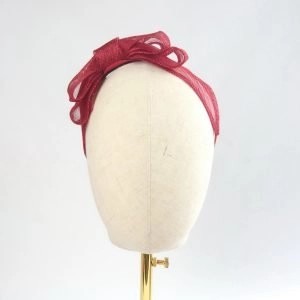 Front view of Red Large Sinamay Bow Fascinator, worn to right