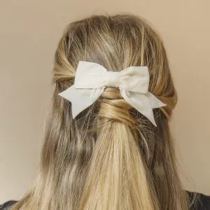 Ivory Velvet Hair Bow worn with a half up do