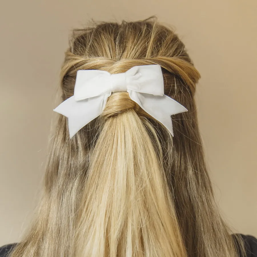 Off White Velvet Hair Bow worn with a half up do