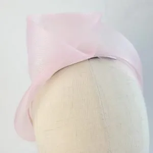 Detail of Pale Pink Crinoline Knot Headband worn to the right of the head