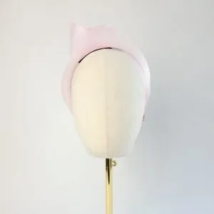 Pale Pink Crinoline Knot Headband worn to the right of the head