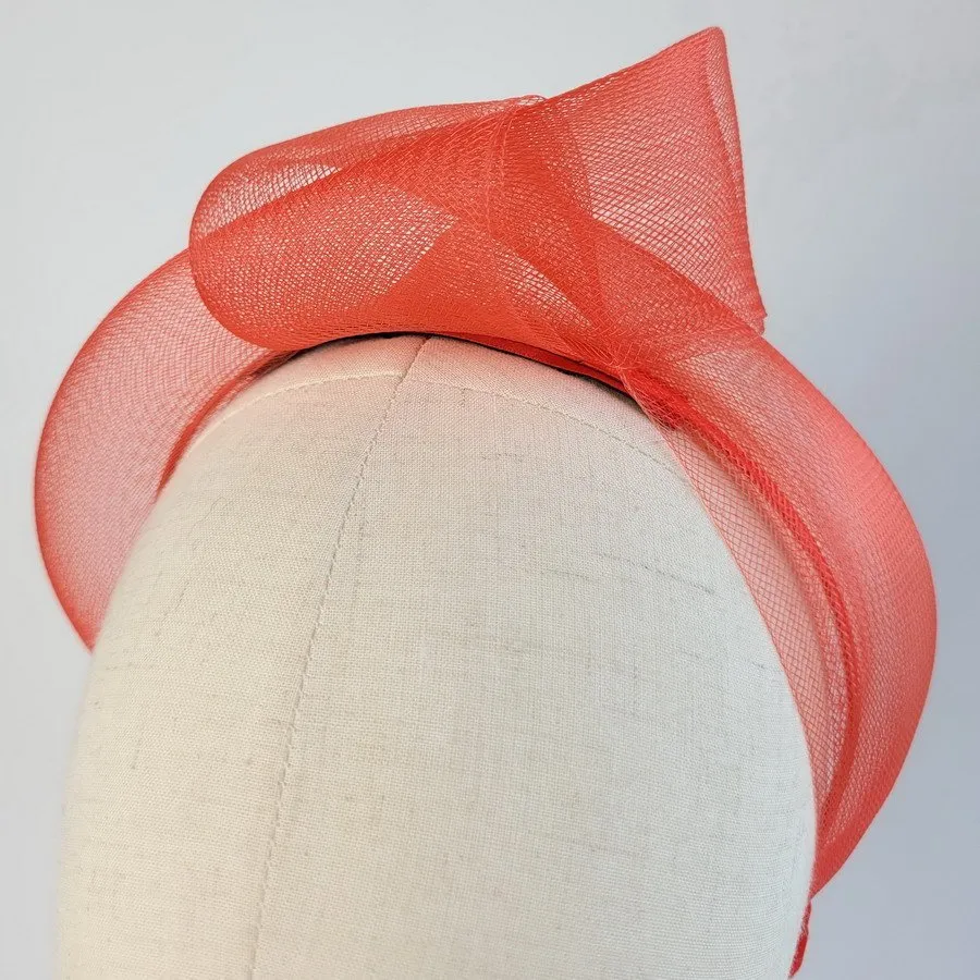 Detail of Red Crinoline Knot Headband worn to the left of the head