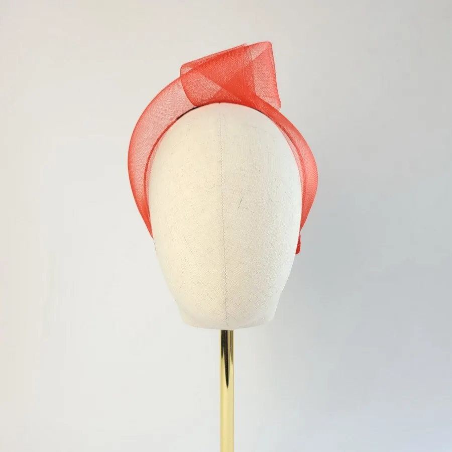 Red Crinoline Knot Headband worn to the left of the head