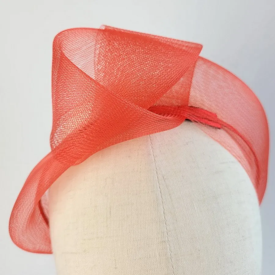 Detail of Red Crinoline Knot Headband worn to the right of the head