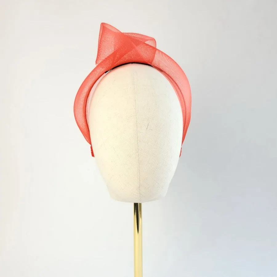 Red Crinoline Knot Headband worn to the right of the head