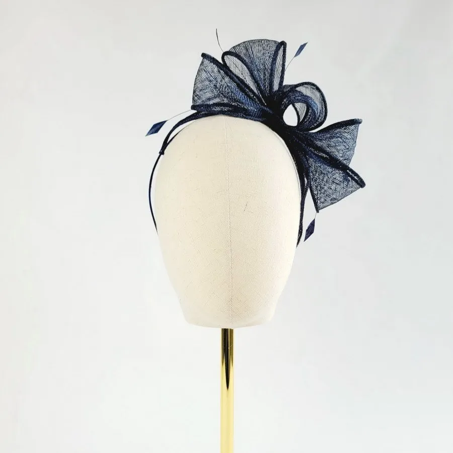 Blue air hostess fascinator with 2024 loops, hydrangers and arrow feather!