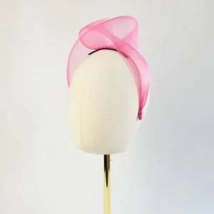 Fuchsia Crinoline Knot Headband worn to the left of the head