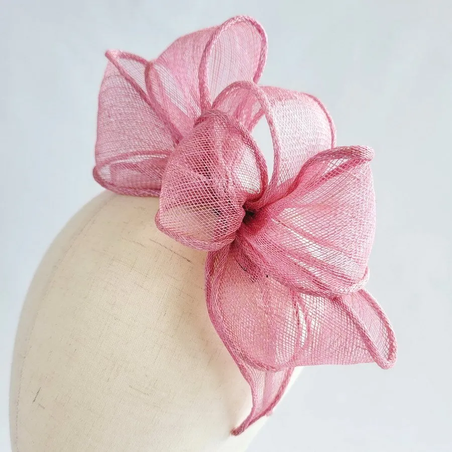 Handmade dusky pink sinamay fascinator by Imogen's Imagination