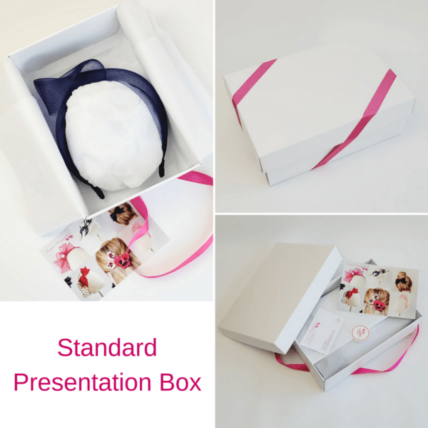 Navy Blue Crinoline Knot Headband in standard white presentation box with pink ribbon