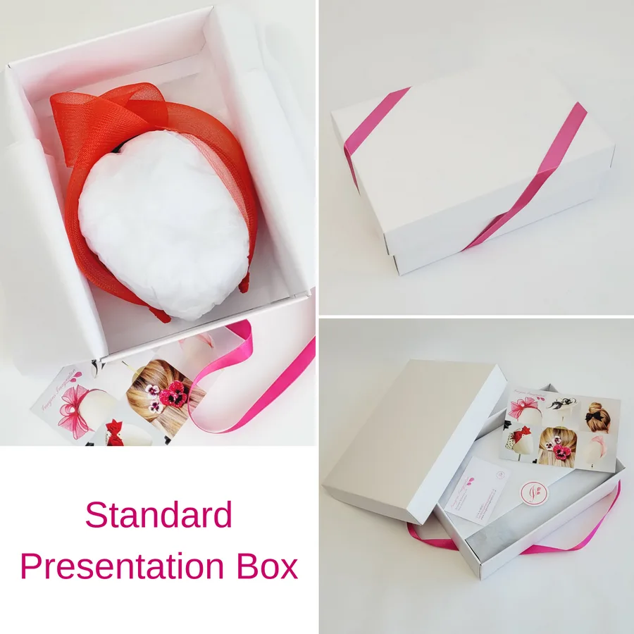 Red Crinoline Knot Headband in standard white presentation box with pink ribbon