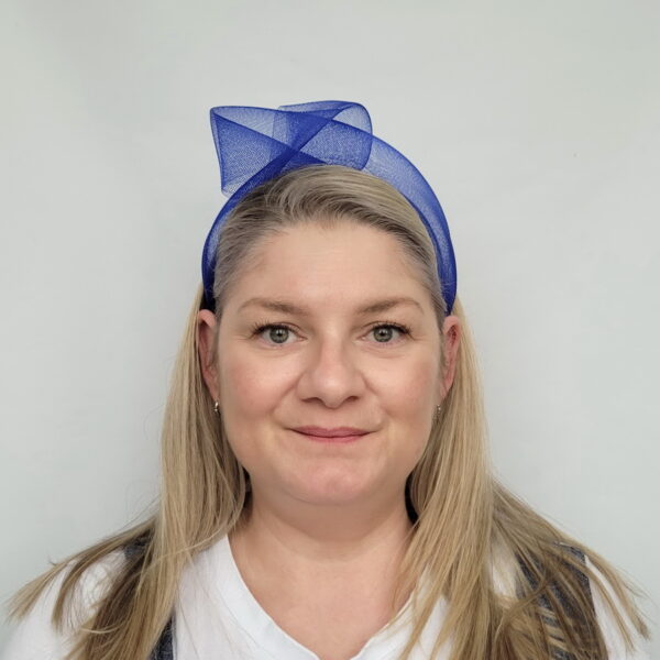 Royal Blue Crinoline Knot Headband worn by a model in her 40s with long blonde hair