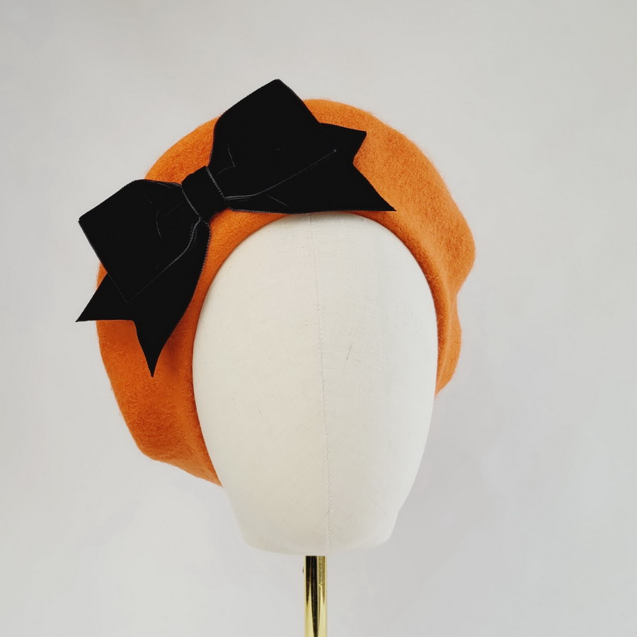 Orange French style beret hat with velvet bow